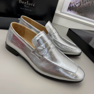 Profile view of Berluti Lorenzo Rimini metallic silver leather loafers showcasing their high-shine finish and sleek profile.