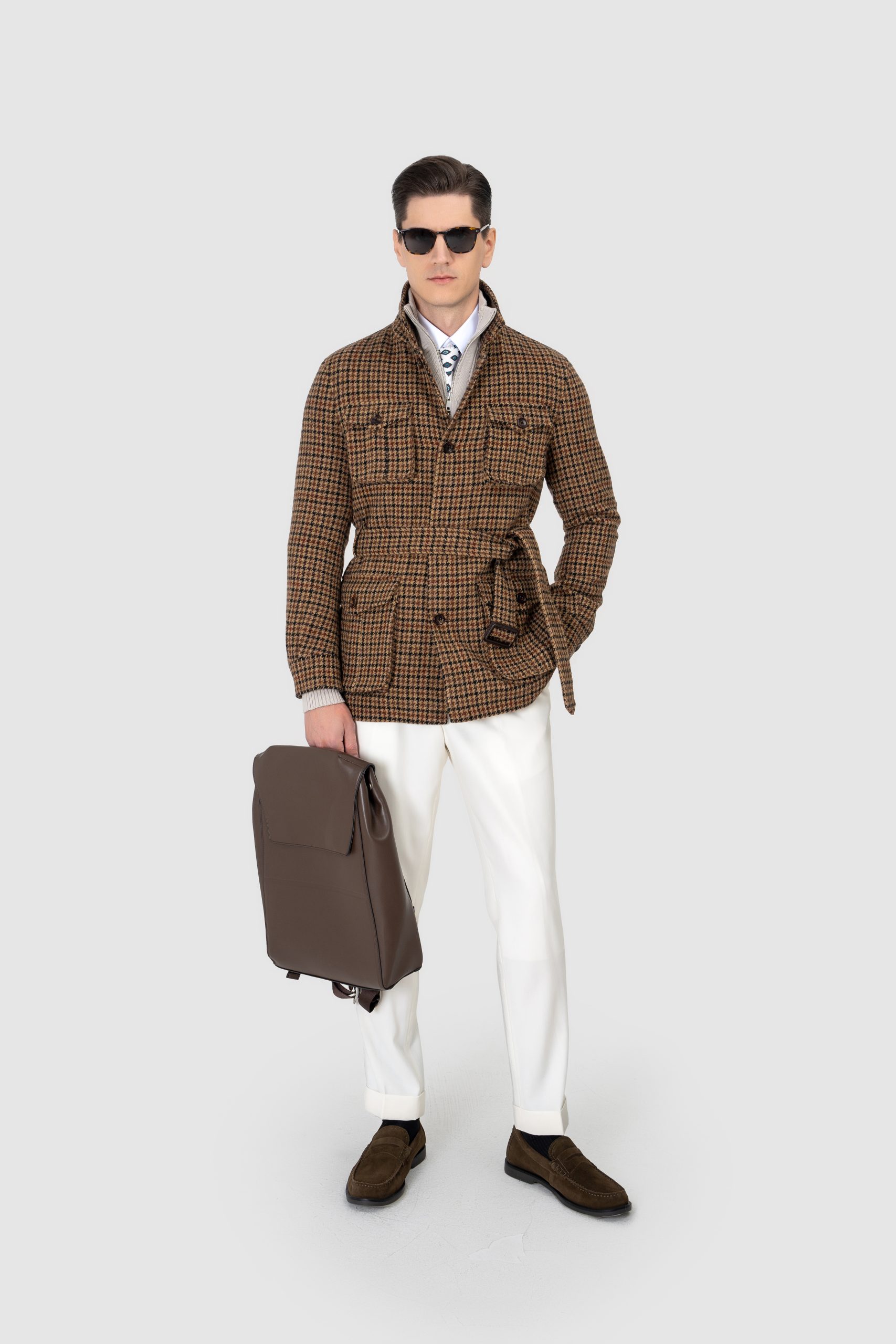 A man wearing a Brown-Check-Wool-Safari Jacket