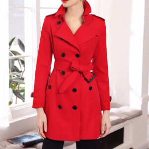 Women's vibrant red double-breasted trench coat with self-tie belt and black buttons, featuring classic collar, epaulets, and back view detail.