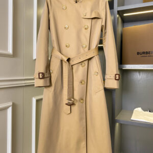 Tailored Mid Beige Double-Breasted Trench Coat with full interior check lining, adjustable belt, and button-tab cuffs.