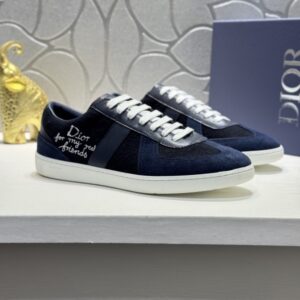 A pair of Dior Navy Blue and Black B27 Low-Top Sneakers featuring white laces and embroidery.