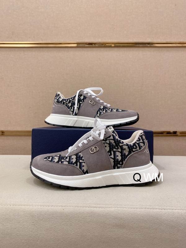 Side profile of Dior B25 Runner sneakers featuring grey suede panels, black Oblique monogram canvas, white laces, and a white rubber sole.