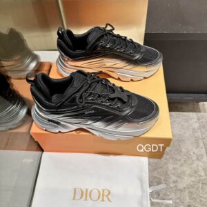 Side view of the Dior B30 Low-Top Sneaker featuring a black and silver gradient technical fabric upper and reflective CD logo accents.
