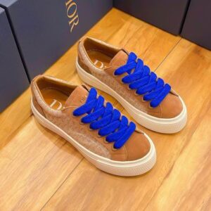 Side view of Dior Camel Suede and Electric Blue B33 Low-Top Sneakers featuring mohair panels and blue laces.