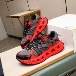 Side profile of Dior Red and Grey B35 Technical Mesh Sneaker featuring a massive red sculpted sole.