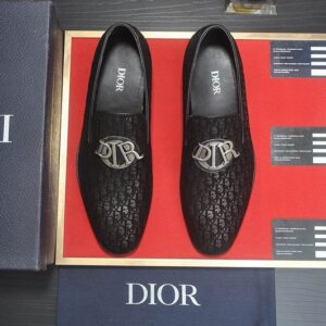 Dior Timeless Loafers in Black Oblique Jacquard fabric featuring a large silver-tone CD buckle on the vamp, displayed against a red background with a Dior box.