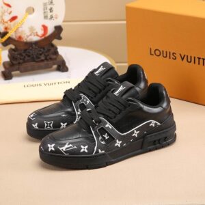 LV Trainer style sneaker, low-top black leather with all-over white monogram pattern and thick black rubber sole.