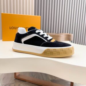 Side view of a black suede low-top sneaker inspired by Louis Vuitton Trainer, with white midsole and unique tan gum outsole detailing.