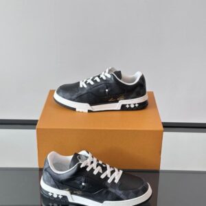 Black synthetic leather Louis Vuitton inspired low-top trainer with subtle checkerboard pattern, white sole, white laces, and Monogram flower motif.