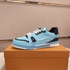 Side view of the Louis Vuitton Trainer Sneaker - Marine Blue showing the script signature and monogram details.