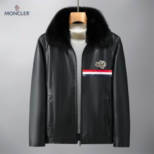 A black faux leather zip-up jacket with a plush black faux fur collar. The chest features a prominent red, white, and blue tri-color stripe below a circular logo patch
