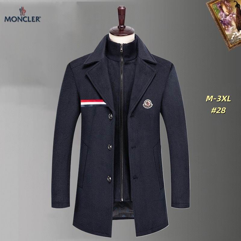 Men's dark navy Moncler-style wool-blend overcoat featuring tricolor stripe chest trim, an embroidered logo patch, and a zippered stand-collar inner layer, displayed on a mannequin