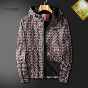 Moncler-style men's full-zip hooded jacket with a repeating circular logo pattern in brown, black, and white. The jacket has a small branded patch on the chest and a black inner lining.