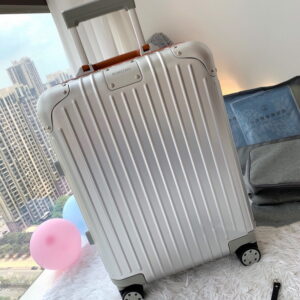 Rimowa Silver and Red Suitcase Shoes, 55x40x23cm, red handle luggage, aluminum cabin bag, 35L suitcase, luxury travel shoes, TSA lock luggage, premium rolling case, unisex luggage, silver and red suitcase.