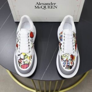 Alexander McQueen White Cartoon Oversized Sneakers with colorful character graphics on white platform sole