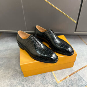 Pair of Alligator Embossed Formal Oxford Shoes on an orange box.