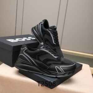 Side profile of Armani All Black Sneakers showcasing the metallic eagle logo, matte black upper, and thick black treaded sole.