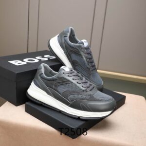 Side view of Armani Grey and White shoes showing the white eagle logo, grey suede overlays, and a thick white midsole.