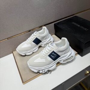 Side view of Armani White Sport Sneakers in white with navy AX logo and visible air cushion sole.