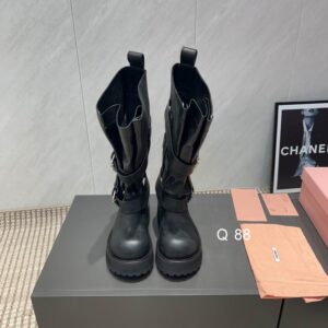 Balenciaga Urban Moto Biker Boot in black leather with heavy platform lug soles and multiple silver buckle straps.