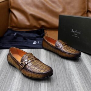 Pair of Berluti Cognac Loafers with crocodile-embossed leather and Scritto calligraphy detailing.