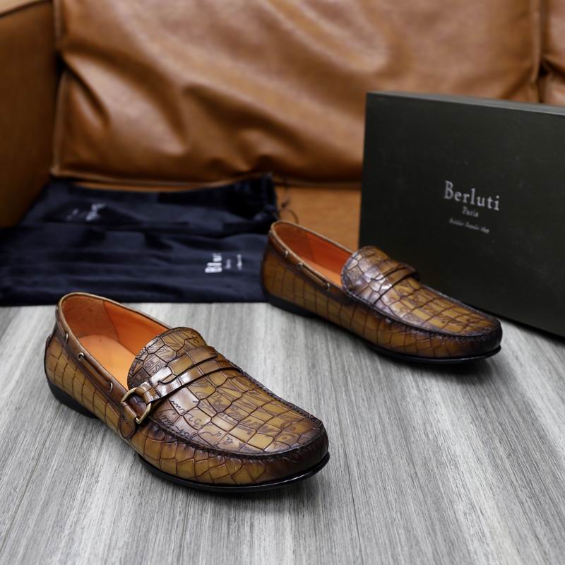 Pair of Berluti Cognac Loafers with crocodile-embossed leather and Scritto calligraphy detailing.