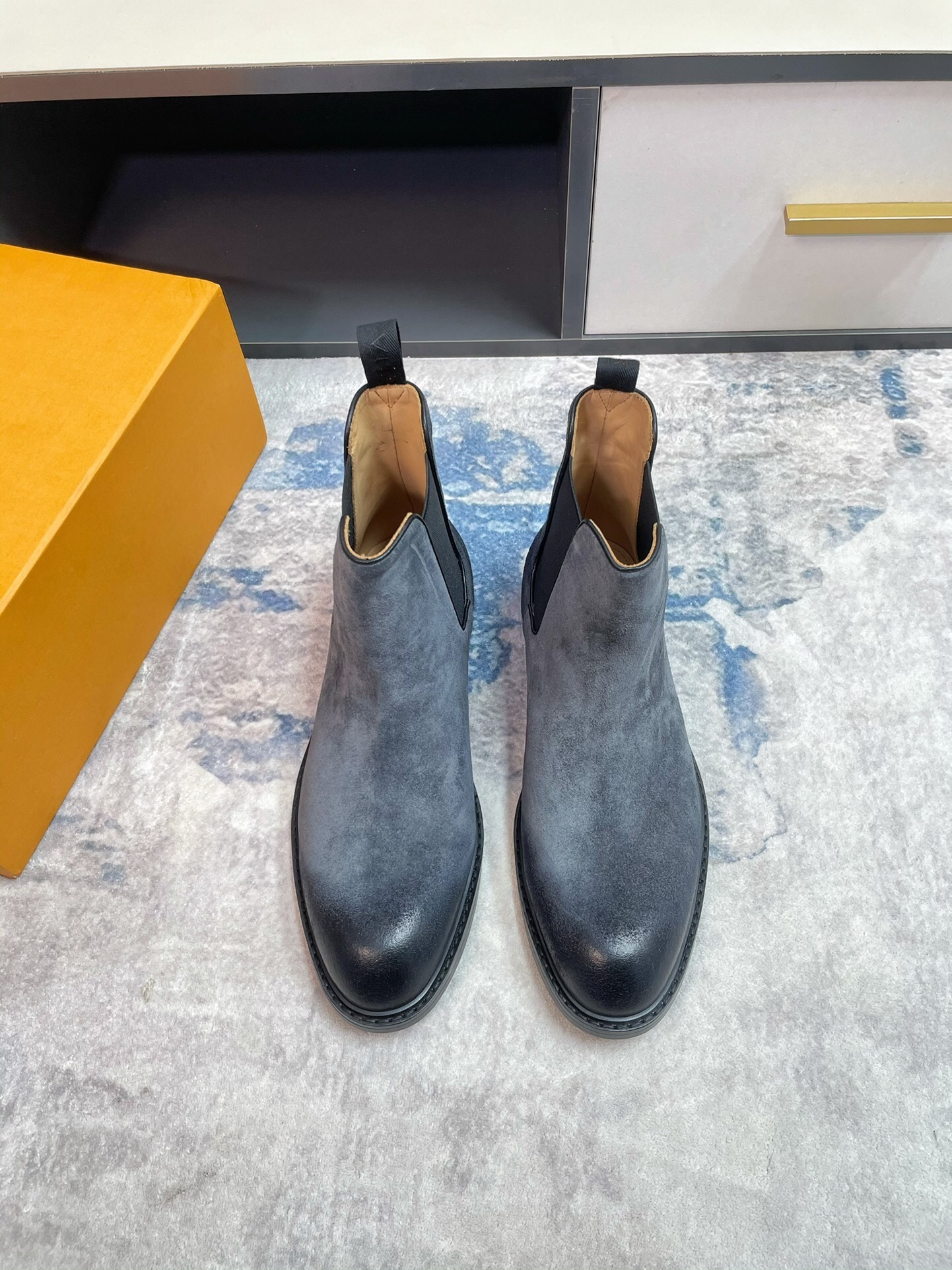 Pair of Chelsea - Ocean Blue Suede - Boots showing velvety Nubuck texture and clean lines.