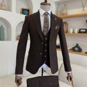A men's Coffee Brown Slim Fit 3-Piece Suit including a matching vest and patterned tie on a display mannequin.