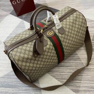 A Gucci Beige GG Supreme Web Duffle Bag featuring the iconic green and red stripe and brown leather trim, sized 52 x 33 x 27 cm.