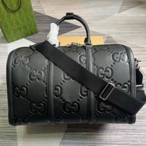 A side and bottom view of the Gucci Black Duffle Bag in embossed black leather.