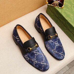 Gucci Blue GG Velvet Horsebit Loafers with antique gold horsebit detail and embossed GG pattern.