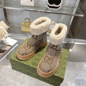 Gucci Camel Monogram Shearling Boots