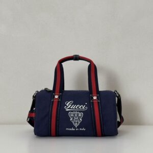 A Gucci Navy Canvas Mini Duffle Bag featuring red and navy Web straps, black leather trim, and silver hardware, sized 30 x 16 x 15 cm.