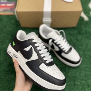LV X NIKE AIR FORCE 1 Low Monogram Black White sneakers, showing the black and white color blocking, debossed Monogram pattern, and stylized "AIR" branding on the midsole.