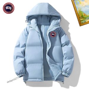 A vibrant Light Blue Hooded Puffer Jacket with a quilted design and protective winter hood.
