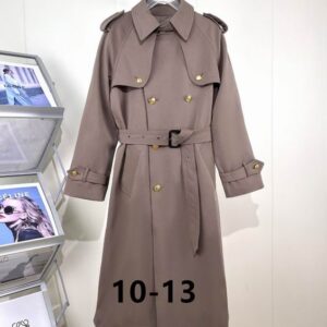 Long double-breasted unisex trench coat in Greige/Taupe with gold buttons, belted waist, and classic trench features.
