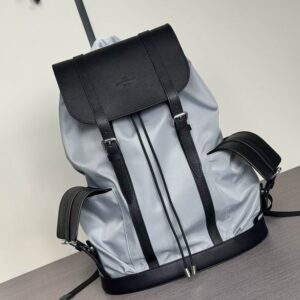 Front view of the Louis Vuitton Black Grained Leather Racer Backpack in textured black leather featuring a front zipped pocket and buckle flap.