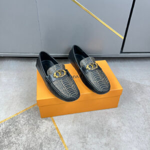 Louis Vuitton Black Grey Croc Emblem Loafers with black leather sides grey croc textured front gold emblem detail and slip on sole