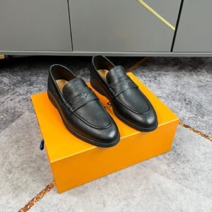 Louis Vuitton Black Leather Penny Loafer with textured leather finish displayed on orange box