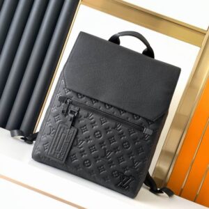 A front-facing view of the Louis Vuitton Black Monogram Shadow Steamer Backpack in embossed black leather featuring a top flap and buckle closures.