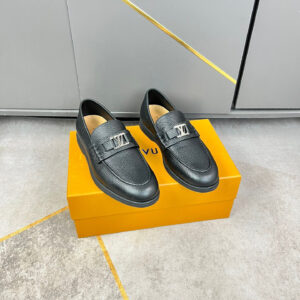 Louis Vuitton Black Pebble Leather Comfort Loafers with textured leather and emblem detail