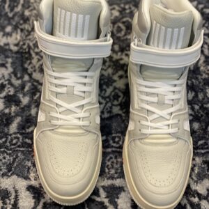 Top view of the Louis Vuitton LV Trainer High in beige leather, showing the "408" logo and white ankle strap.