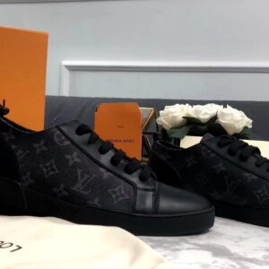Rear and side view of the Louis Vuitton Match-Up Sneaker in black monogram showing the leather heel tabs and the LV signature canvas side panels.