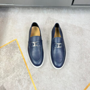 Louis Vuitton Navy Pebble Leather Loafers with textured leather finish and emblem detail