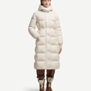 front view of a woman wearing a Moncler Cream Long Puffer Coat.
