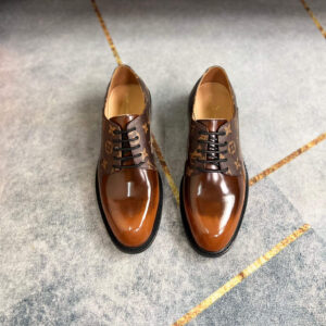 Pair of Monogram Patina Derby Shoes showing Brown Calfskin Toe and Monogram Canvas side panels.