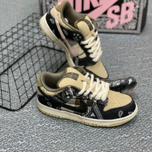 Profile view of Nike Black/Parachute Beige SB Dunk Low featuring paisley overlays and rope laces.