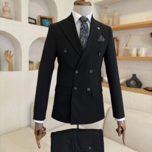 Front view of a Sartorial Black Double-Breasted Formal Suit on a mannequin, featuring a paisley tie and white shirt for a gala look.
