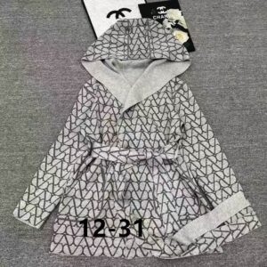 Flat lay of a Valentino Grey Monogram Hooded Cardigan with a matching belt and hood.