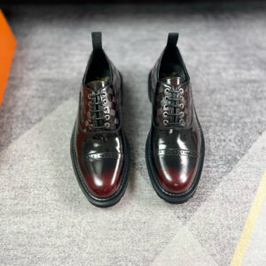 front view of the Varenne Damier Oxford Shoe showing the high-shine gradient leather toe and embossed checkerboard pattern.